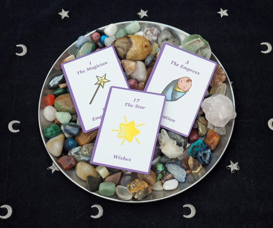 Neshla Avey the learner tarot cards in bowl with crystals